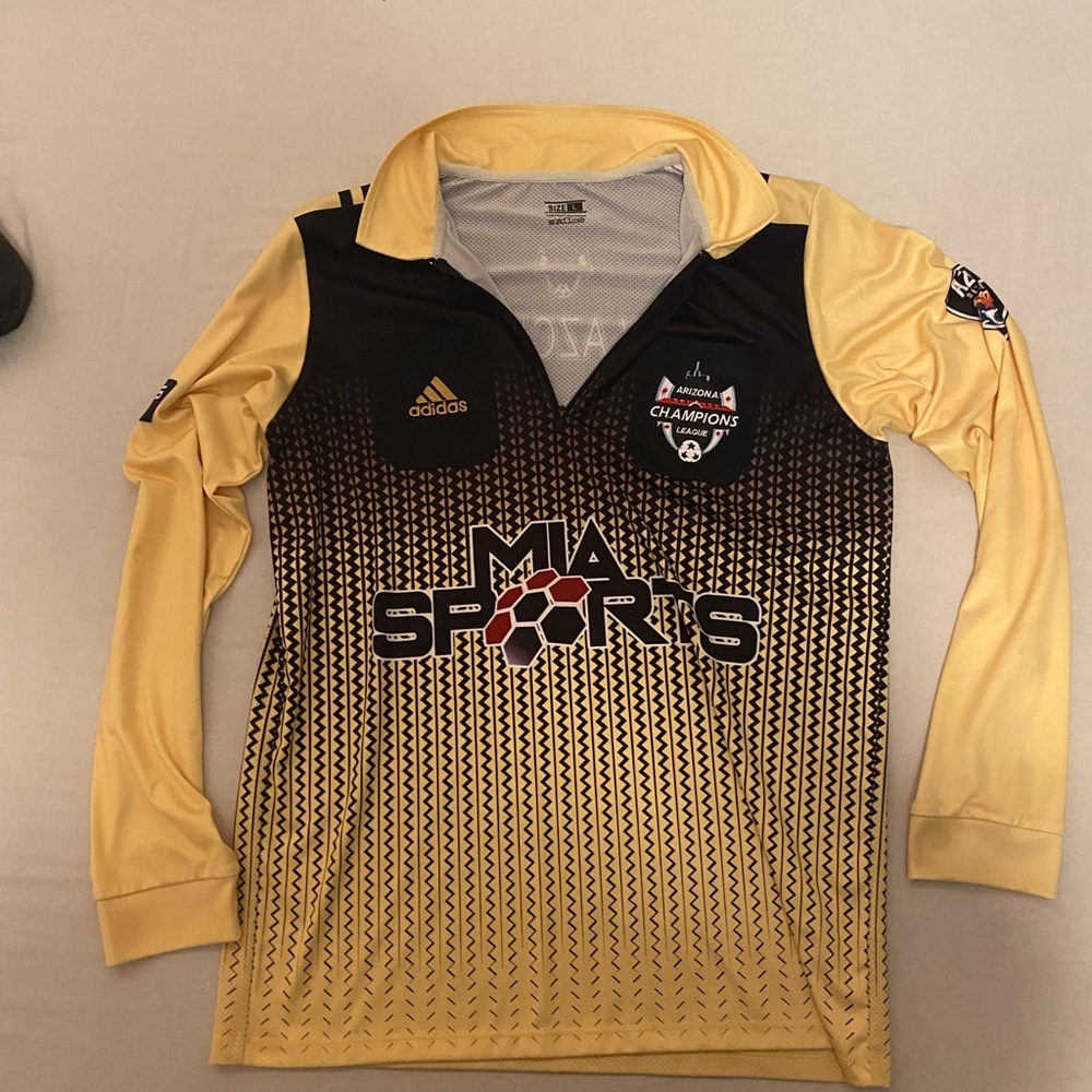 Arizona champion league referee shirt.